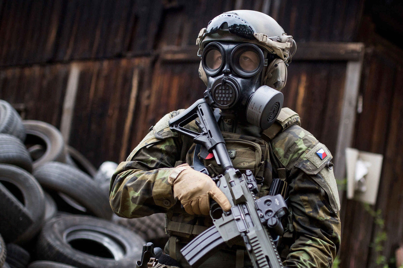 Soldier with full military wearing wearing the CM-7M NATO gas mask